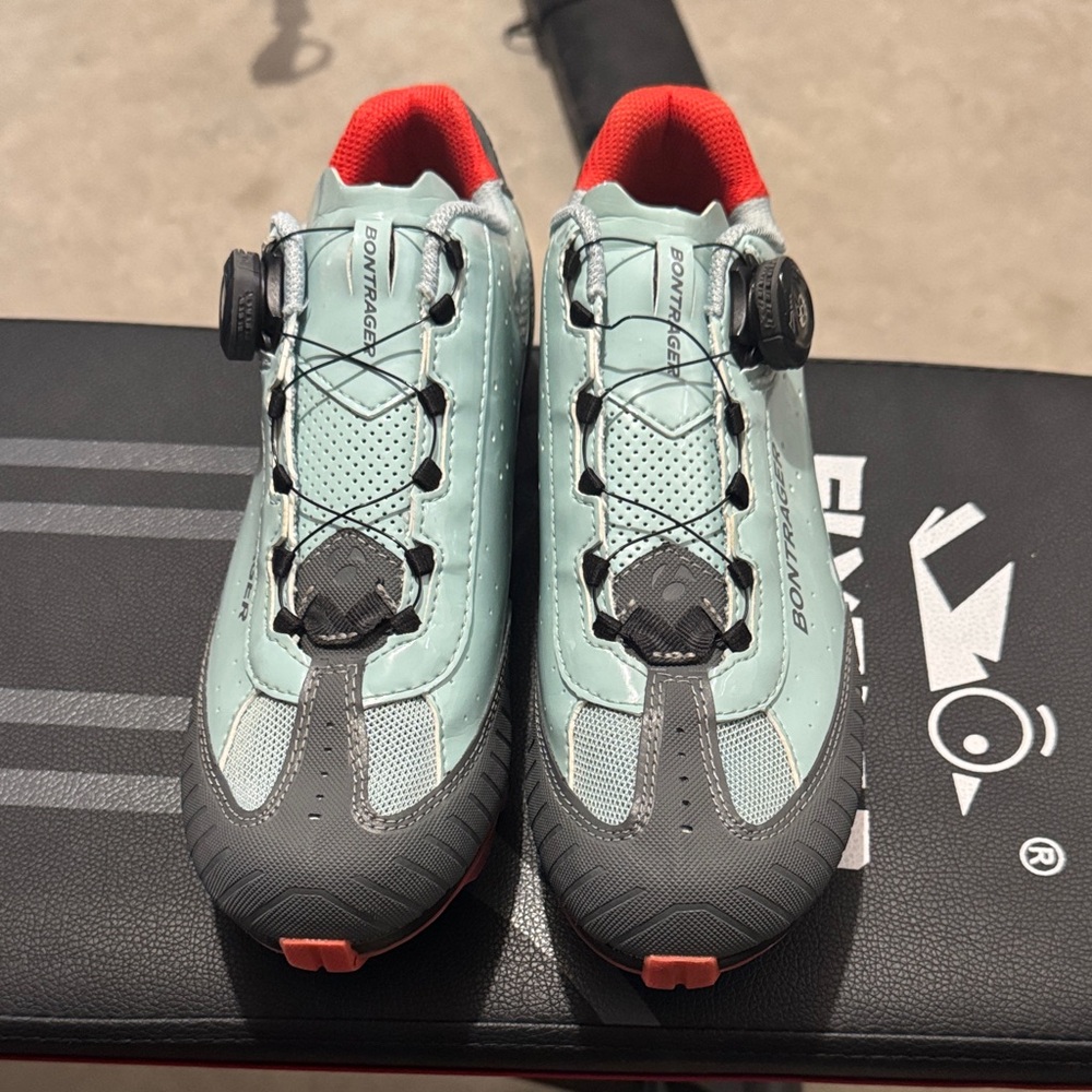 Bontrager Cycling Shoes with Orange, Light Blue and Gray.